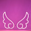 pink-neon-angel-wings-sign-on-a-glowing-pink-background