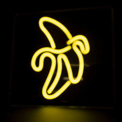 A peeled banana neon light - with a bright yellow neon glow