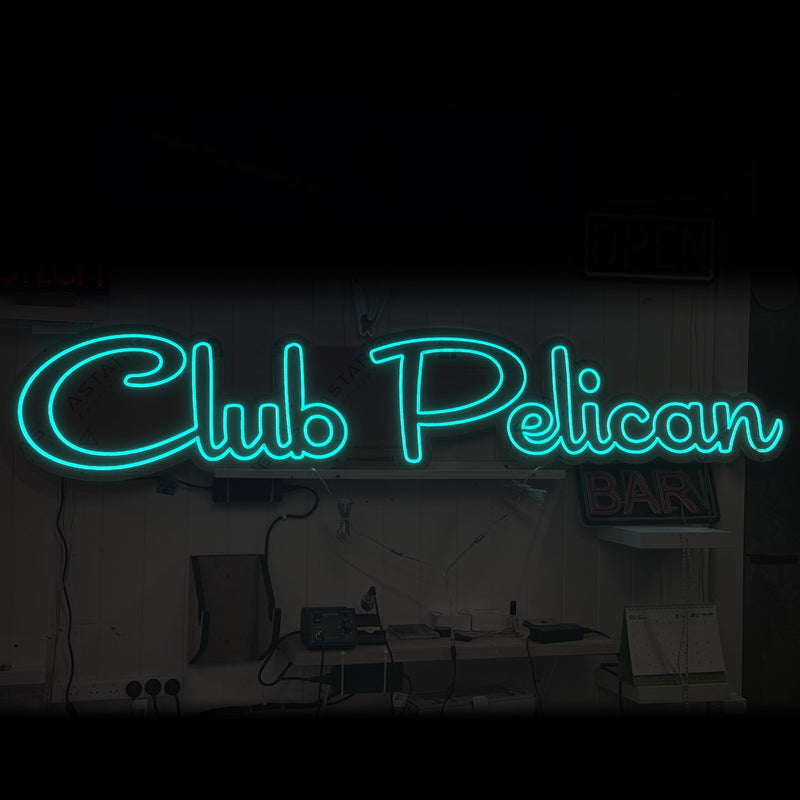 Club Pelican logo neon sign in aqua script, made by The Neon Lady