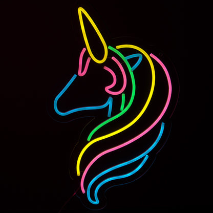 yellow,pink.blue and green unicorn neon light shining bright on a black background