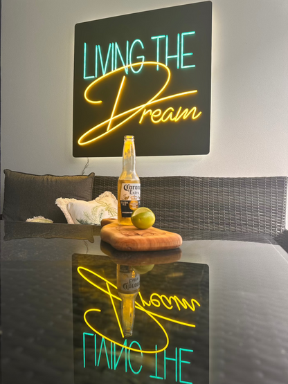 Blue and yellow neon sign mounted on a balcony setting