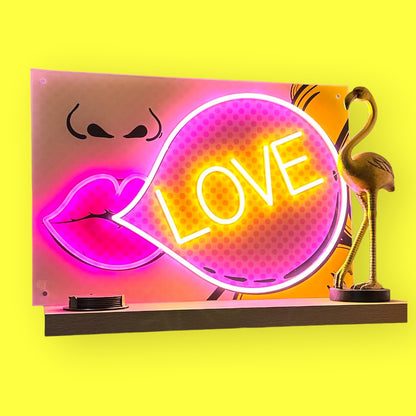 the love pop art artwork printed on acrylic with illuminated led neon highlights on a vibrant yellow background