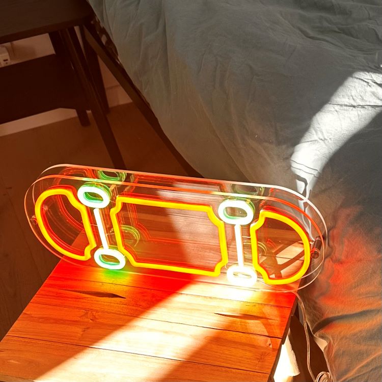 led-neon-skateboard-light-standing-on-a-bed-side-table