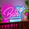 A [ink and blue cocktail bar sign creating the perfect atmosphere in a bar wetting 