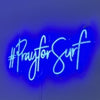 #Pray for Surf dark blue neon sign on clear acylic background by The neon lady Sunny Coast